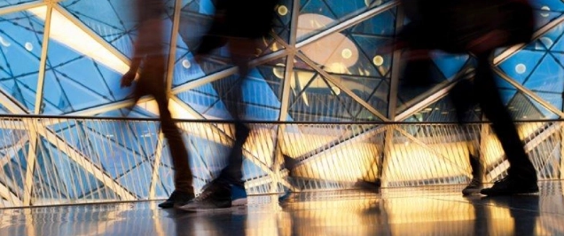 Image of people inside a glass building